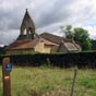 L'glise Saint-Jacques de Sensacq est construite entre le xie sicle et le xiie sicle, sur l'emplacement d'un site antique dont elle remploie les matriaux. Elle subit des dmolitions dues aux guerres de Religion dans les Landes avant d'tre restaure. Autrefois place sous l'invocation de Saint Jacques, elle est dote d'un clocher-mur et de fonts baptismaux carolingiens par immersion. Sa situation isole en rase campagne tonne. Elle est le vestige d'un ensemble plus vaste, comme son patronage le laisse supposer, mais aussi des marques de tcheron du chevet : ces signatures de tailleurs de pierre sont les mmes qu' Aire-sur-l'Adour. Pas de traces de vote mais une charpente en carne de bateau qui l'imitait,mise  jour par les monuments historiques.