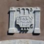 Inscription dcouverte sur la faade d'une ancienne maison de Peyrehorade....