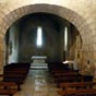 Larressingle: Nous pntrons dans l'glise Saint-Sigismond qui est compose de deux parties. Lorsque l'on y rentre, on accde directement dans le choeur de l'glise primitive avec sa vote en cul de four. Pour pouvoir construire le donjon, il a fallu couper l'glise primitive et la tronquer au niveau de son transept.