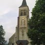 Asson: L'glise Saint-Martin construite au XIIIe sicle sera bien souvent remanie avant d'tre brle par les protestants en 1569.Elle a gard malgr tout quelques beaux lments du XVe sicle, notamment son portail en accolade,les votes des chapelles, et un tryptique de l'cole flamande reprsentant la Crucifixion.
