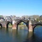 Aprs le monastre primitif de Perse, dont il ne reste rien, et le chteau de Calmont, le Pont-Vieux est par ordre de construction, le troisime difice remarquable de la zone et le premier de la ville proprement dite. Le pont actuel avec ses arches semi-gothiques est le fruit de modifications qui se sont succdes au cours de son histoire. Seuls les soubassements encastrs dans la roche sont pratiquement d'origine et son aspect s'est plusieurs fois modifi pour s'adapter aux contraintes de l'histoire et  l'accroissement constant du trafic routier qui n'a cess de s'intensifier au cours des sicles.
