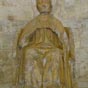  Un pape sur le trne pontifical, drap dans sa chape et coiff de la tiare.... Probablement une vocation de Saint Pierre, premier pape,titulaire de cette glise . uvre classe du XVe sicle malheureusement mutile!