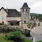 Corn: L'entre du village et son glise Saint-Laurent peu de temps aprs l'glise l'glise de Boussac.