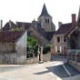 Ainay-le-Chteau est au Moyen ge une des dix-sept chtellenies des ducs de Bourbon en Bourbonnais. La ville est alors close de remparts et un chteau se dresse autour de l'glise Saint-tienne.