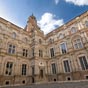  L'htel d'Asszat est un htel particulier, lev en 1555-1557 sur les plans de Nicolas Bachelier, le plus grand architecte toulousain de la Renaissance. C'est sans contesre, le plus bel htel de Toulouse. Derrire un monumental portail en bois se cache une cour intrieure, rnove en 1993. Il abrite le muse de la Fondation Bemberg qui prsente une collection d'art, notamment de peinture, du XVe au dbut du XXe sicle. Deux des cts de la cour comportent une lvation  trois niveaux superposant les trois ordres classiques (ordre ionique, ordre dorique, ordre corinthien) ; il s'agit, avec le chteau de Caumont, galement construit par Nicolas Bachelier en 1535 et la Cour Carre du Louvre construite par Pierre Lescot  partir de 1546, d'une des premires manifestations du classicisme franais. 