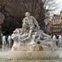 La statue de Pierre Goudouli (pote toulousain du dbut du XVIIe sicle) par Alexandre Falguire orne la place Wilson.