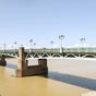 Le premier Pont Saint-Pierre a t construit entre 1849 et 1852. C'tait un pont en bois,  page, o passaient pitons et voitures  cheval. Il reposait sur deux piles de pierre et de briques, et tait renforc par des cbles mtalliques.  Lors de la grande inondation de 1875, un ingnieur de la mairie fit sectionner les cbles. Trs endommag, le pont Saint-Pierre fut confi  la ville en 1904, laquelle supprima le page en mme temps qu'elle interdit le passage des voitures. Lorsque la municipalit se dcida  reconstruire le tablier, en 1927, elle opta pour un pont suspendu,  l'armature mtallique, juge plus esthtique.  60 ans de trafic ininterrompu achevrent de fissurer l'ouvrage. 30 millions de francs furent runis en 1984, et trois ans plus tard un nouveau pont tait construit, long de 240 mtres.   
