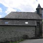 Borce : Lglise Saint-Michel, rnove au XVIIe sicle prsente un bnitier remarquable en calcaire noir orn dune coquille Saint-Jacques, dun bourdon et dun masque barbu.