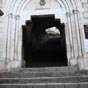 Parvenu en haut du grand escalier, le plerin franchit la porte sainte pour arriver au coeur du sanctuaire o se trouvent 8 difices religieux dont la crypte Saint-Amadour qui est le plus ancien et dont la fonction est de servir de fondation  la basilique Saint-Sauveur qui est juste au-dessus. Toutes les deux sont inscrites depuis 1998 au patrimoine mondial de l'humanit de l'UNESCO dans le cadre des chemins de Saint-Jacques de Compostelle.