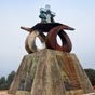 Monument commmorant la venue du pape Jean-Paul II en 1989 et qui avait runi cinq cent mille jeunes. Mais bien avant eux , ils furent des millions au fil des sicles  venir, de ce belvdre couronn d'une chapelle Saint Marc et de trois croix de bois, contempler, avant d'y entrer, cette cit qu'Aymeri Picaud appela 