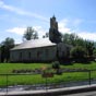Audressein. A lorigine cette glise datant du XIIIme sicle navait quune seule nef, termine par une abside pentagonale et coupe par un transept. Objet d'un plerinage trs frquent au XIVme sicle, l'glise, fut agrandie de deux nefs latrales, coupes au transept, et prcdes par un porche couvert d'une vote d'artes dont la clef est orne de l'agneau pascal. Le campanile fut lev  la mme poque. Plus tard, le porche fut complt par deux porches latraux.  ct de la porte du XIII sicle, furent ouvertes une porte au Nord et une au sud dates de 1564. Ce porche est compos de trois traves communiquant entre elles par deux arceaux en arc bris dont la vote centrale est divise en quatre compartiments triangulaires. Des peintures dcorent l'intrados des trois arceaux. On y voit quatre anges musiciens, Saint Jean-Baptiste et Saint Jacques. De chaque ct de la porte de l'glise quatre panneaux sont peints, et deux fois deux autres en regard des premiers sur les parois intrieures des piliers. Ces fresques sont des ex-voto. Les costumes permettent de dater ces peintures du XVme sicle. D'autres peintures  peine dcelables, dcoraient le mur du fond au-dessus de la porte de l'glise et reprsentaient des scnes de la vie de la Vierge. A noter sous le porche, une belle croix de pierre, avec au verso une vierge  lenfant.