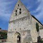 L'glise de  Saint Antoine:Sous trois voussures romanes reposant sur chapiteaux et colonettes, le tympan est dcoup en quatre lobes outrepasss.