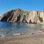 Un superbe panorama entoure la plage du Silence!