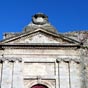 Aniane :Dtail de la faade de la chapelle des pnitents blancs