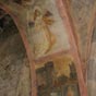 Peinture murale en l'glise d'Audressein : ange musicien jouant de la vielle mdivale  l'aide d'un archer.
